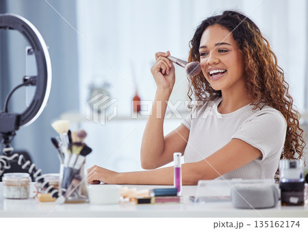 Makeup influencer, brush and happy woman streaming tutorial for beauty, fashion and broadcast for cosmetics. Live stream, filming and content creator and make up vlogging with phone and ring light. Makeup influencer, brush and happy woman streaming tutorial for beauty, fashion and broadcast for cosmetics. Live stream, filming and content creator and make up vlogging with phone and ring light. 135162174