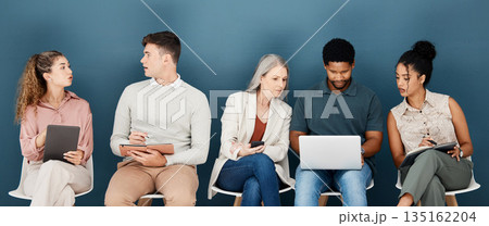 Laptop, phone and business people waiting for job interview, vacancy and career opportunity in office. Technology, diversity and men and women candidates for hr meeting, recruitment and employment Laptop, phone and business people waiting for job interview, vacancy and career opportunity in office. Technology, diversity and men and women candidates for hr meeting, recruitment and employment 135162204