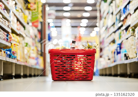 Shopping basket, floor and grocery store for discount, sale and promotion for food, product and customer experience. Plastic container, supermarket or mall for retail, sales and trading for choice 135162320