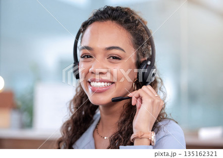 Portrait, call center and a woman consulting in an office for telemarketing or sales assistance. Customer service, smile or contact with a happy young consultant working in support using a headset 135162321