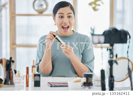 Makeup influencer, beauty and excited woman streaming tutorial for cosmetics, social media or skincare. Review, live stream and content creator girl with smile, broadcast and skin care channel 135162411