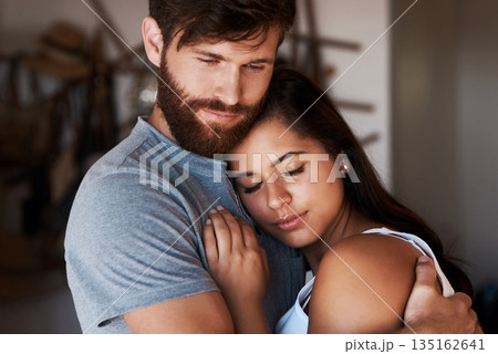 Love, marriage support and couple hug for relationship security, empathy and safety care in home apartment lounge. Intimacy, commitment and romantic man, woman or people hugging with sweet affection 135162641
