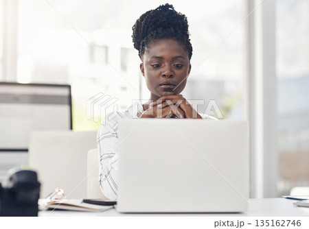 Business, woman and reading on a laptop with internet in africa for entrepreneurship for a company. Professional female, computer and focus for research for working online at a startup or office. 135162746