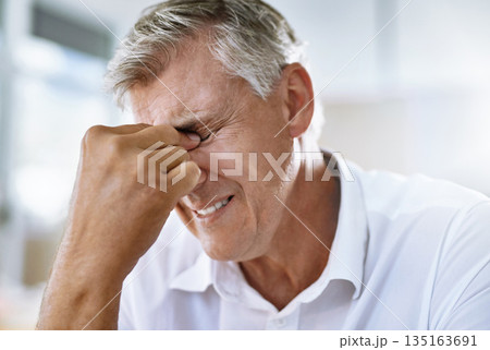 Pain, headache and senior businessman in the office with a corporate mistake or company crisis. Exhausted, burnout and sick professional mature male manager with a stress migraine in workplace. Pain, headache and senior businessman in the office with a corporate mistake or company crisis. Exhausted, burnout and sick professional mature male manager with a stress migraine in workplace. 135163691