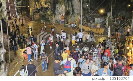 This is cave diorama features golden temples, ritual figures, and natural rock textures, blending Hindu symbolism in Batu Cave inside This is cave diorama features golden temples, ritual figures, and natural rock textures, blending Hindu symbolism in Batu Cave inside 135163704