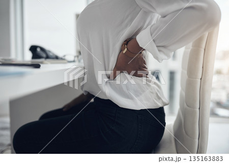 Tired, back pain and ache with business woman in office for stress, frustrated and muscle fatigue. Burnout, tension and body with closeup of female employee for spine injury, accident and emergency Tired, back pain and ache with business woman in office for stress, frustrated and muscle fatigue. Burnout, tension and body with closeup of female employee for spine injury, accident and emergency 135163883