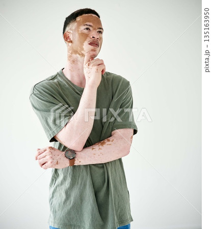 Memory, man against a white background and thinking for problem solving. Remember or thoughtful ideas, solution or contemplating and young male person against studio backdrop for inspiration. 135163950