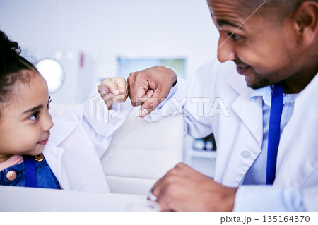 Family, girl and father with fist bump, science and happiness with development, growth and research. Female child, male parent and daughter in a laboratory, scientist and bonding with love and care Family, girl and father with fist bump, science and happiness with development, growth and research. Female child, male parent and daughter in a laboratory, scientist and bonding with love and care 135164370
