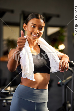 Gym, portrait or happy woman with thumbs up in fitness training with positive mindset or motivation. Wellness, smile or healthy female personal trainer in workout with like hand gesture or thumb up Gym, portrait or happy woman with thumbs up in fitness training with positive mindset or motivation. Wellness, smile or healthy female personal trainer in workout with like hand gesture or thumb up 135164416