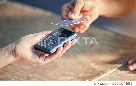 Closeup, hands of person with credit card and wireless pay machine for payment. Subscription or cashier, digital transaction or promotion and customer paying membership with bank information Closeup, hands of person with credit card and wireless pay machine for payment. Subscription or cashier, digital transaction or promotion and customer paying membership with bank information 135164692