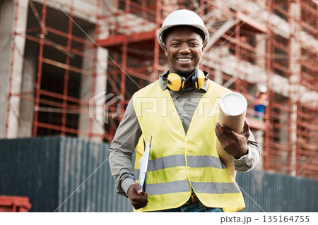 Architect, black man and plan outdoor at construction site building with a smile for development. Happy African engineer person portrait for project management, inspection or architecture blueprint Architect, black man and plan outdoor at construction site building with a smile for development. Happy African engineer person portrait for project management, inspection or architecture blueprint 135164755