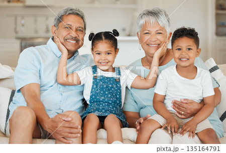 Family, grandparents and grandkids smile in portrait, happiness and bonding at home. Love, care and trust with elderly people and young children in living room, relationship and happy at house Family, grandparents and grandkids smile in portrait, happiness and bonding at home. Love, care and trust with elderly people and young children in living room, relationship and happy at house 135164791