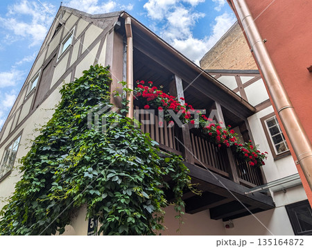 Beautiful balcony decorated with geranium flowers Beautiful balcony decorated with geranium flowers 135164872