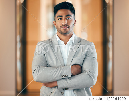 Portrait, business and man with arms crossed, serious and career in a workplace, suit or formal. Face, male person or employee with confidence, professional or office with startup, company or growth Portrait, business and man with arms crossed, serious and career in a workplace, suit or formal. Face, male person or employee with confidence, professional or office with startup, company or growth 135165060