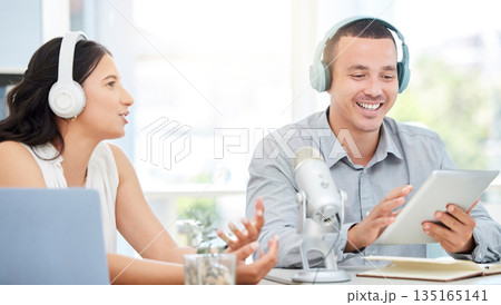 Tablet, happy man or woman live streaming podcast media, online radio or broadcast network. Influencer host, teamwork or journalist reporter talking or speaking of live digital news on blog together Tablet, happy man or woman live streaming podcast media, online radio or broadcast network. Influencer host, teamwork or journalist reporter talking or speaking of live digital news on blog together 135165141