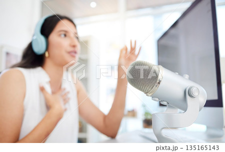 Blur, microphone or woman live streaming a podcast media or online radio on news broadcast network. Influencer host, blurry presenter or girl journalist reporter talking, recording or speaking alone 135165143
