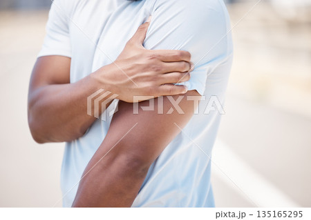 Arm pain, sport injury and person with muscle, inflammation and accident from fitness. Outdoor, athlete and injured joint in arms from workout, exercise and training on a road for wellness and health 135165295