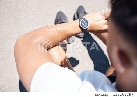 Exercise, smart watch and man in city for time, heart rate and cardio for running, fitness and workout. Wellness, sports and male person check wristband for marathon training, monitor and performance Exercise, smart watch and man in city for time, heart rate and cardio for running, fitness and workout. Wellness, sports and male person check wristband for marathon training, monitor and performance 135165297