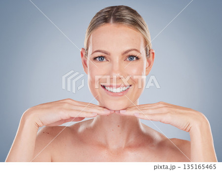 Beauty, skincare and happy with portrait of woman in studio for facial, cosmetics and natural makeup. Self care, wellness and mockup with face of model on grey background for glow, smile and collagen Beauty, skincare and happy with portrait of woman in studio for facial, cosmetics and natural makeup. Self care, wellness and mockup with face of model on grey background for glow, smile and collagen 135165465