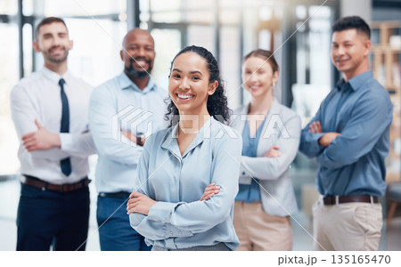Smile, group of business people in portrait with woman boss, confidence and pride at project management company. Teamwork, commitment and vision, happy team with arms crossed in coworking start up. Smile, group of business people in portrait with woman boss, confidence and pride at project management company. Teamwork, commitment and vision, happy team with arms crossed in coworking start up. 135165470