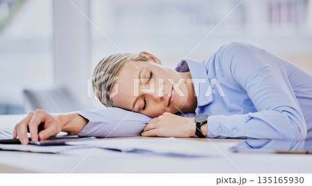 Sleeping, business woman and tired office employee at work with rest from work deadline. Notes, female worker and sleep op a company sales analyst with paperwork and nap from buyer report project Sleeping, business woman and tired office employee at work with rest from work deadline. Notes, female worker and sleep op a company sales analyst with paperwork and nap from buyer report project 135165930