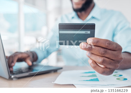 Credit card, payment and person online shopping with laptop, internet or web for ecommerce purchase in an office. Digital, African and business man or employee pay on a website in a company Credit card, payment and person online shopping with laptop, internet or web for ecommerce purchase in an office. Digital, African and business man or employee pay on a website in a company 135166229