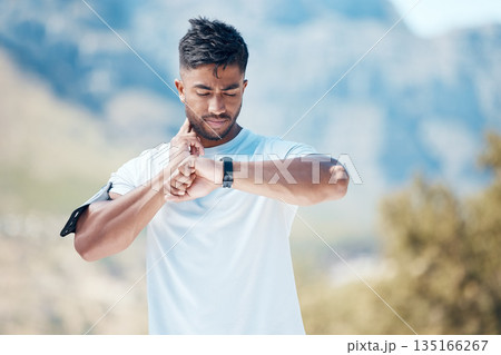 Health, smartwatch and athlete training heart rate for outdoor sports, marathon or cardio strength with mountain exercise. Fitness, watch and young man or runner on a hike workout for wellness Health, smartwatch and athlete training heart rate for outdoor sports, marathon or cardio strength with mountain exercise. Fitness, watch and young man or runner on a hike workout for wellness 135166267