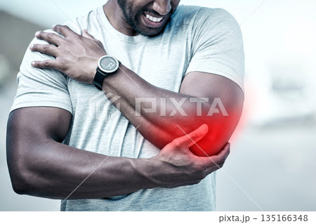 Fitness, elbow and injury with a sports man holding his joint in pain while outdoor for a workout. Exercise, anatomy and accident with a male athlete feeling tender while training for recreation Fitness, elbow and injury with a sports man holding his joint in pain while outdoor for a workout. Exercise, anatomy and accident with a male athlete feeling tender while training for recreation 135166348