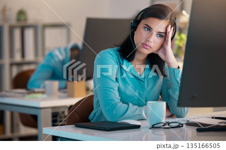 Call center, bored and tired woman in office for customer service or support at night. Telemarketing, computer and fatigue of female sales agent, burnout consultant or lazy employee with crm deadline 135166505