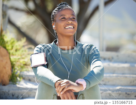 Smile, fitness and black woman with on steps, music and relax with earphones, exercise and workout goal. Female person, girl and athlete listening to sound, audio and calm outdoor, sports or wellness Smile, fitness and black woman with on steps, music and relax with earphones, exercise and workout goal. Female person, girl and athlete listening to sound, audio and calm outdoor, sports or wellness 135166715