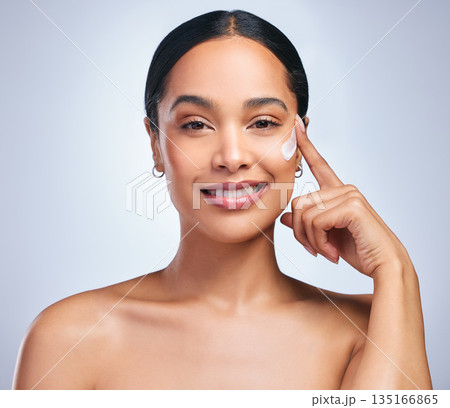 Beauty cream, woman and portrait of skincare with dermatology and face cleaning. Wellness, lotion and young female model smile with skin glow product and treatment with care and moisturizer in studio Beauty cream, woman and portrait of skincare with dermatology and face cleaning. Wellness, lotion and young female model smile with skin glow product and treatment with care and moisturizer in studio 135166865