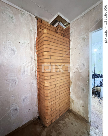 Fresh brickwork of a construction furnace. Rear side. General view. 135166956