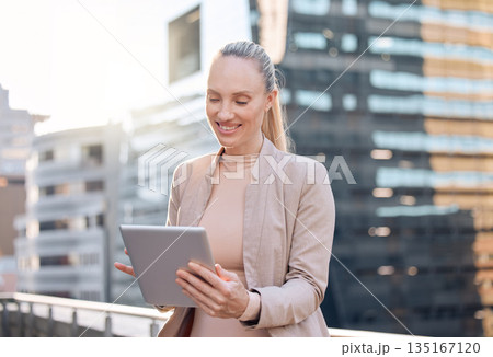 Smile, businesswoman with tablet and happy in city background outdoors. Social media or connectivity, online communication and networking with female person writing an email on rooftop of building Smile, businesswoman with tablet and happy in city background outdoors. Social media or connectivity, online communication and networking with female person writing an email on rooftop of building 135167120