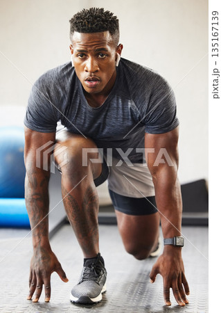 Fitness, exercise and black man in a gym, training and workout goal with wellness, health and breathing. Male person, guy or athlete in a recreation center, sports and commitment with a challenge 135167139
