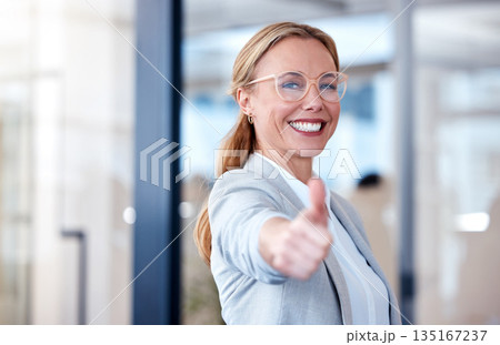 Business woman, portrait smile and thumbs up for success, winning or thank you at the office. Happy female person, CEO or employee with thumb emoji, yes sign or like for win, goals or motivation 135167237