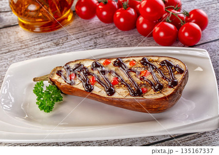 Baked eggplant half with teriyaki 135167337