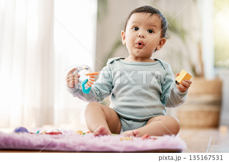 Portrait, wow and surprised baby with toys on floor for fun, playing and game at home. Face, shock and toddler boy with creative building blocks for child development, learning or play in living room Portrait, wow and surprised baby with toys on floor for fun, playing and game at home. Face, shock and toddler boy with creative building blocks for child development, learning or play in living room 135167531