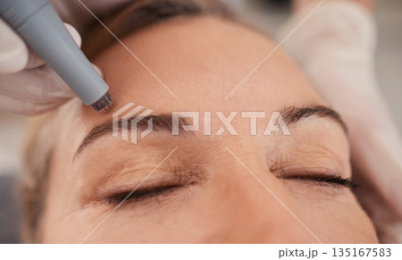 Microneedling, eyebrow and woman for beauty, skincare and cosmetics with collagen treatment or wellness. Customer, people or dermatology worker hands with microblading, hair or face permanent makeup 135167583