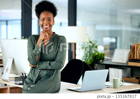 Portrait of confident black woman in modern office with smile, computer and African entrepreneur with pride. Happy face of businesswoman at small business startup and female boss at management agency Portrait of confident black woman in modern office with smile, computer and African entrepreneur with pride. Happy face of businesswoman at small business startup and female boss at management agency 135167817