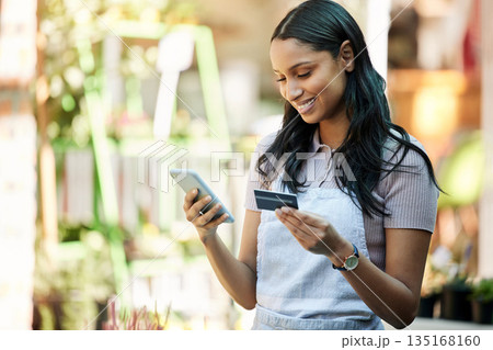 Woman, credit card and business owner with ecommerce, online shopping and digital payment. Outdoor, banking app and female employee with a smile with mobile connectivity on web for purchase at cafe Woman, credit card and business owner with ecommerce, online shopping and digital payment. Outdoor, banking app and female employee with a smile with mobile connectivity on web for purchase at cafe 135168160