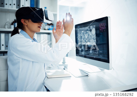Woman, scientist and VR goggles with metaverse, futuristic tech and computer screen, science innovation in lab Virtual reality, simulation and digital data, scientific experiment and female doctor 135168292