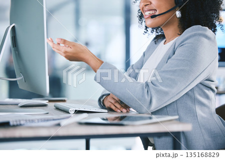 Call center, customer service and a woman talking at computer with microphone. Hand and smile of african person as crm, telemarketing and sales or technical support agent with headset and desktop pc Call center, customer service and a woman talking at computer with microphone. Hand and smile of african person as crm, telemarketing and sales or technical support agent with headset and desktop pc 135168829