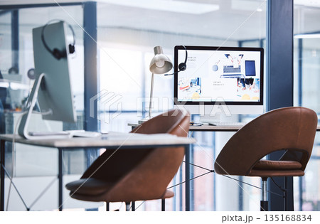 Internet, call center and headset on a computer screen in an empty office space for customer service. Crm, telemarketing and sales or technical support company with contact us website on a desktop Internet, call center and headset on a computer screen in an empty office space for customer service. Crm, telemarketing and sales or technical support company with contact us website on a desktop 135168834
