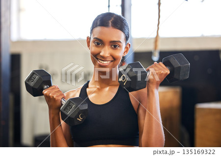 Fitness, dumbbells or portrait of happy woman training, exercise or workout for powerful arms or muscles. Dumbbell curls, strength or Indian girl athlete lifting weights or exercising biceps at gym 135169322