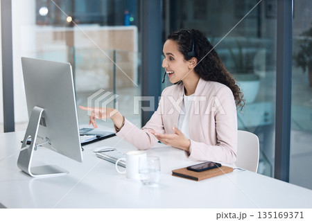 Call center, video call and woman in customer support on computer with headset for consulting. Telemarketing, communication and female worker point to pc screen for crm service, help desk and contact Call center, video call and woman in customer support on computer with headset for consulting. Telemarketing, communication and female worker point to pc screen for crm service, help desk and contact 135169371