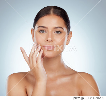 Face, serious skincare and beauty of woman in studio isolated on a white background. Portrait, natural and female model in makeup, cosmetics or facial treatment for skin health, aesthetic or wellness Face, serious skincare and beauty of woman in studio isolated on a white background. Portrait, natural and female model in makeup, cosmetics or facial treatment for skin health, aesthetic or wellness 135169643