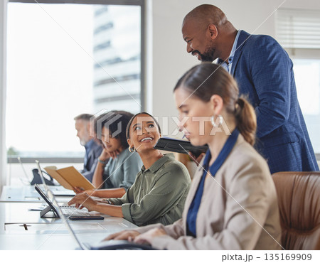 Call center training, happy and people with a manager for telemarketing support and advice. Contact us, check and a black man speaking to a customer care employee about consulting and service 135169909
