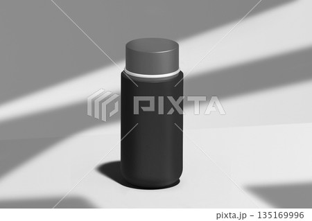 a black bottle with a gray background and a shadow 135169996