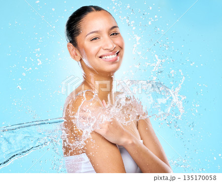 Water, splash and spa with portrait of woman in studio for hygiene, beauty and skincare. Wellness, cleaning and fresh with face of female model on blue background for shower, cosmetics and liquid Water, splash and spa with portrait of woman in studio for hygiene, beauty and skincare. Wellness, cleaning and fresh with face of female model on blue background for shower, cosmetics and liquid 135170058