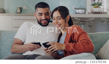 Couple, credit card and online shopping on smartphone in home for digital payment, fintech and money app. Happy man, woman and mobile banking for easy finance, website sales and password of account Couple, credit card and online shopping on smartphone in home for digital payment, fintech and money app. Happy man, woman and mobile banking for easy finance, website sales and password of account 135170536